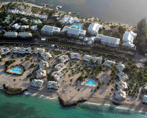 An aerial view of the resort property alongside the ocean.