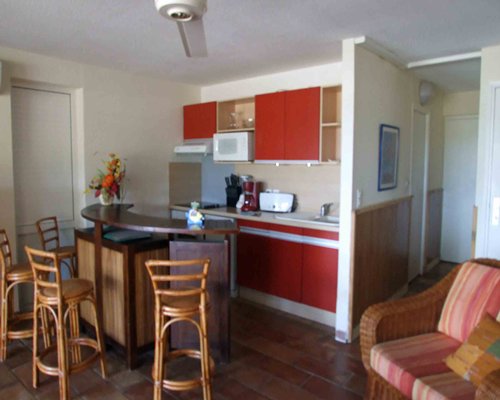 Living room with open plan kitchen and dining area.