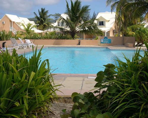 A scenic view of the resort's outdoor swimming pool.