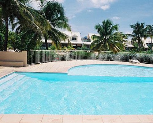 A scenic view of the resort's outdoor swimming pool.
