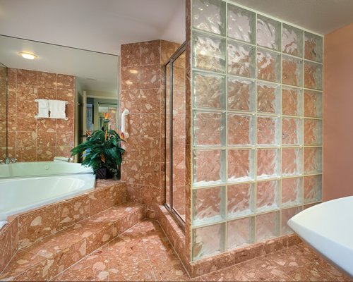 A bathroom with a bathtub.