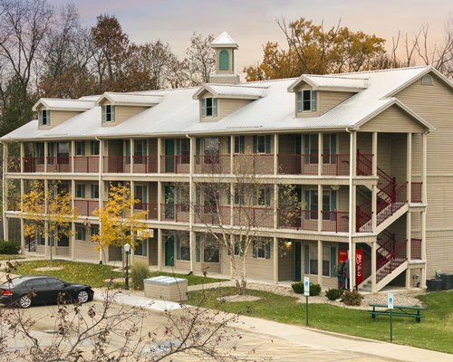 Scenic exterior view of multi story resort units with waterfront.