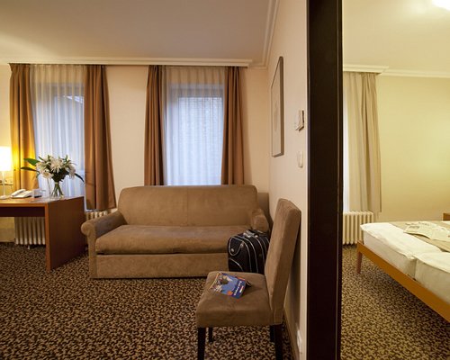 A well furnished living room with a double pull out sofa.