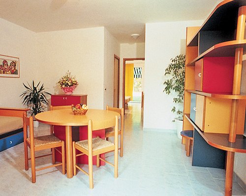 A well furnished living room and dining area.