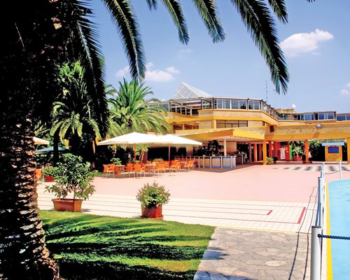 Scenic view of Victor Village Residence Club with an outdoor restaurant.