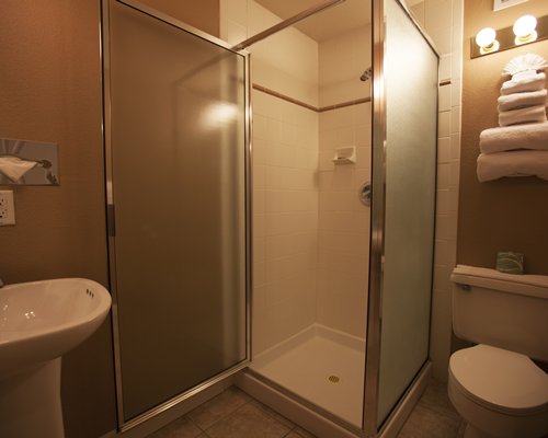 A bathroom with a shower stall.
