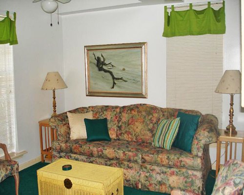 A well furnished living room with double pull out sofa.