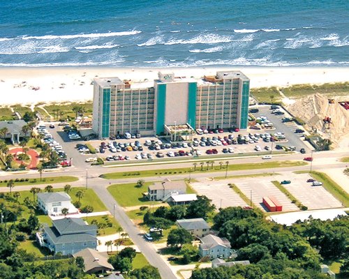 An aerial view of the resort property alongside the ocean.