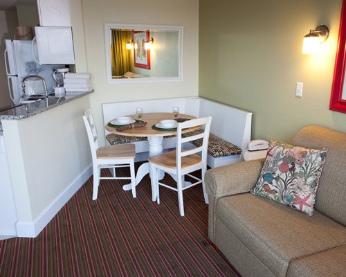 An open plan living dining and kitchen area.
