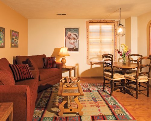 A well furnished living room and dining area.
