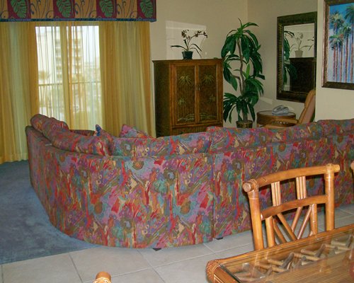 A well furnished living room and dining area.