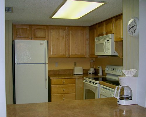 A well equipped kitchen with microwave.