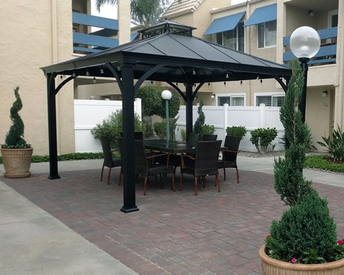 An outdoor patio alongside the resort.