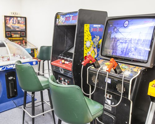 An indoor recreation room with arcade games.