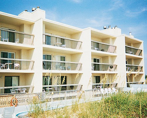 An exterior view of multi story resort units.