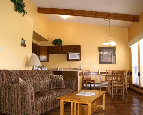 An open plan living dining area and kitchen.