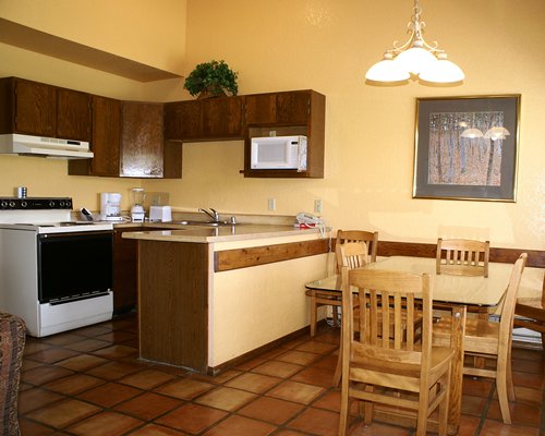 An open plan dining and kitchen area.