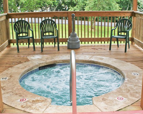 An outdoor hot tub with patio.