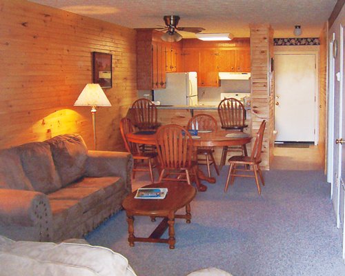 An open plan living and dining area with a kitchen.