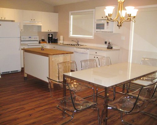 An open plan dining and kitchen area.