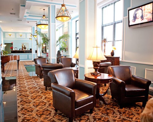 A well furnished lounge area at the resort with a television.