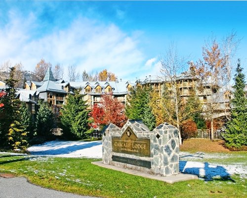 Signboard of Cascade resort alongside multi story resort units.