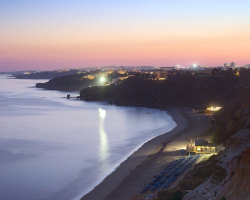View of the beach at dusk.