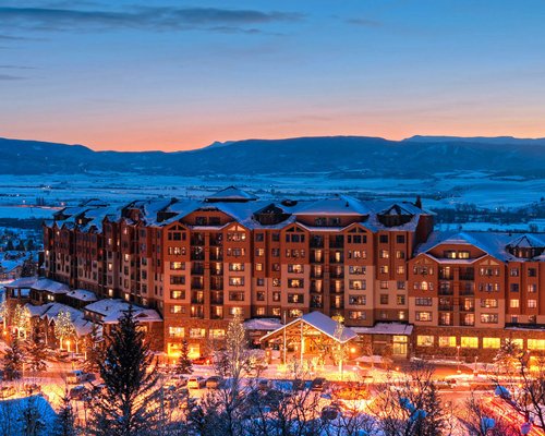 Scenic exterior view of Steamboat Grand Resort Hotel at night.