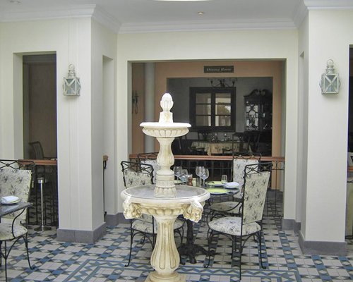 A water fountain in a dining area.