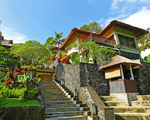 A scenic exterior view of Bali Masari Villas & Spa with staircase.