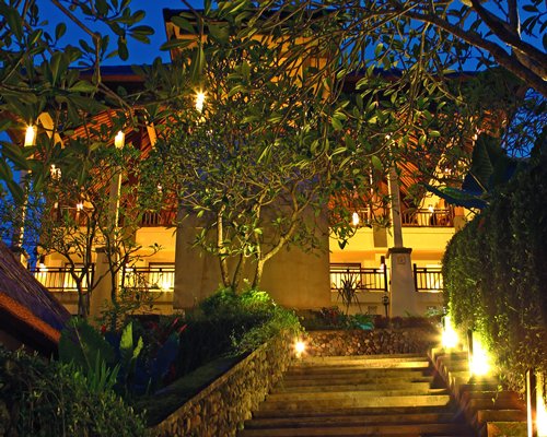 Night view of a stairway leading to the resort.