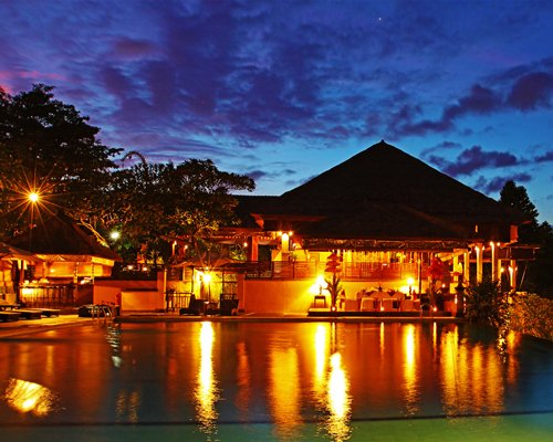 Scenic exterior view of Bali Masari Villas & Spa with outdoor swimming pool.