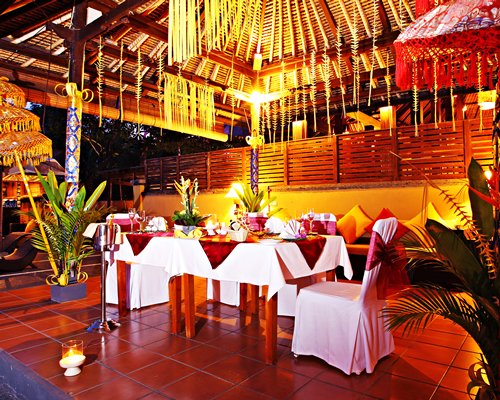 An indoor restaurant at the resort at night.