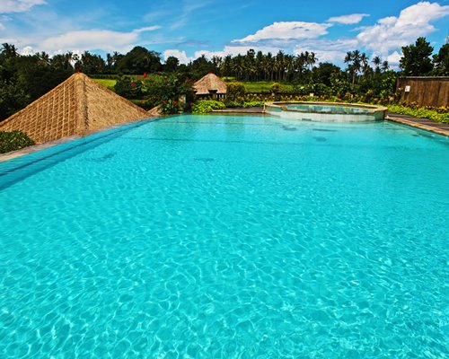 An outdoor large swimming pool at the resort.