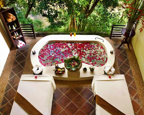 A well furnished indoor spa facility with an outside view.