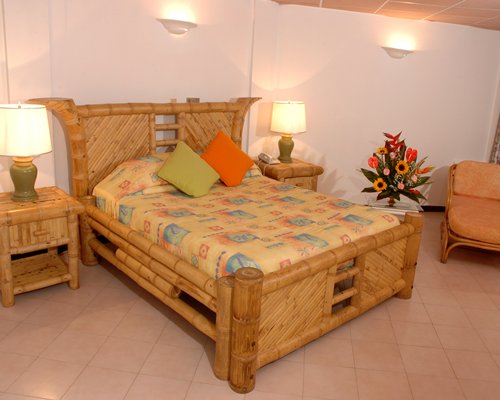 A well furnished bedroom with a double bed.