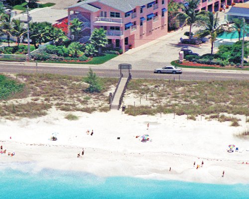 An aerial view of The Penthouses at Gulf Stream with pathway leading to the beach.