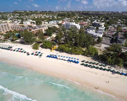An aerial view of the resort property alongside the beach.
