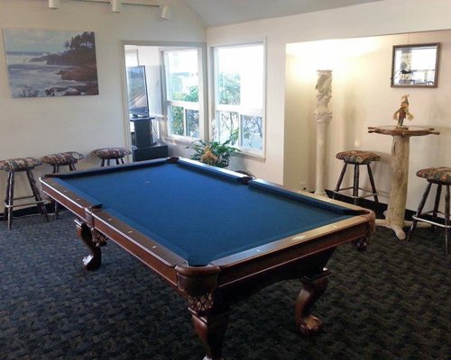 An indoor recreational area with a pool table.