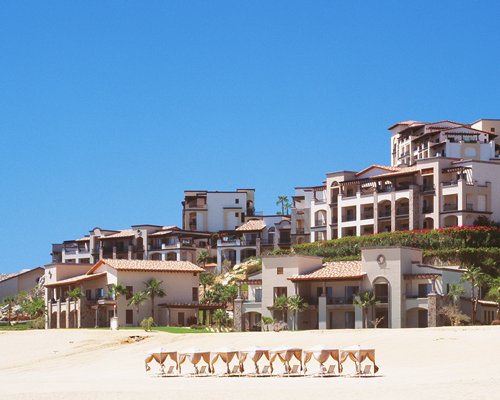 Exterior view of Pueblo Bonito Resort property with the beach beds.