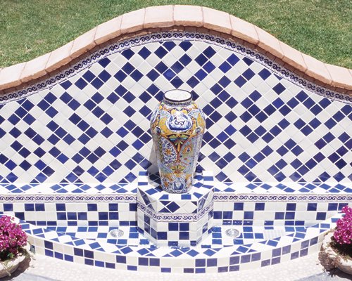 A view of mosque tile design with porcelain vase.