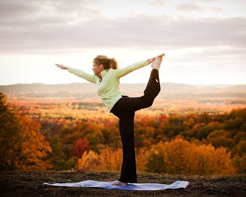 A woman doing yoga.