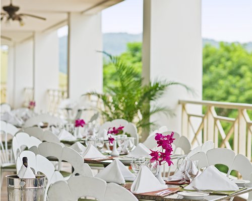 A view of fine dining restaurant with outside view.