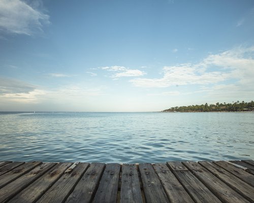 View of the sea with a wooden pier.