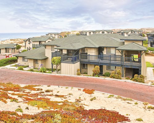 An exterior view of the resort units alongside the bay.