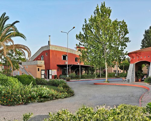 Scenic exterior view and pathway to Eurovillage Club Nausicaa.