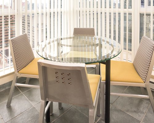 A view of glass top dining table.