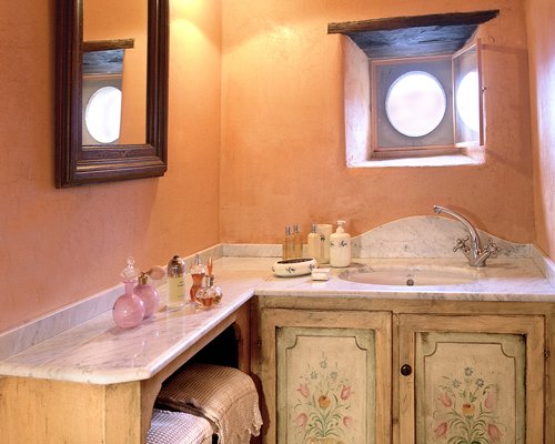 A bathroom with a closed sink vanity.