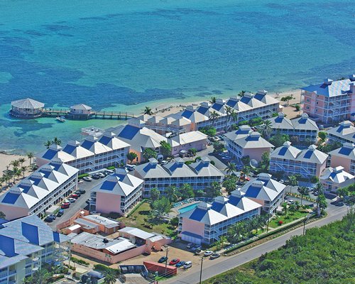 Aerial view of the resort property alongside the sea.