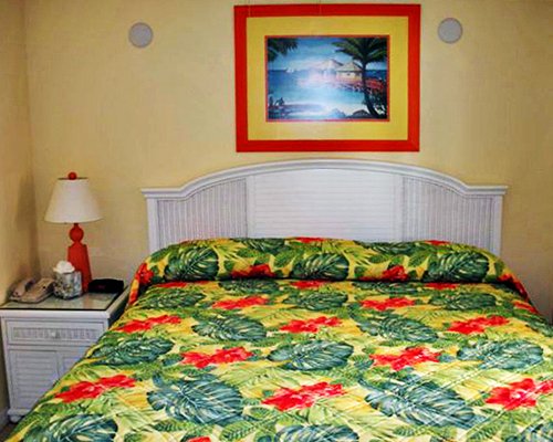 A well furnished bedroom with king bed.